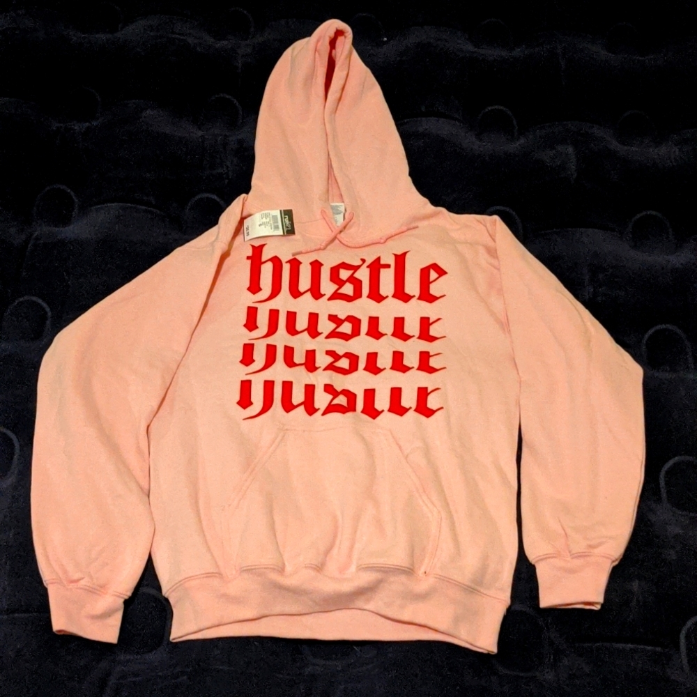 Small pink "hustle" hoodie with red lettering. From the Rue21 store.